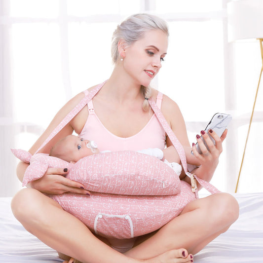 Ergonomic baby nursing pillow for feeding support