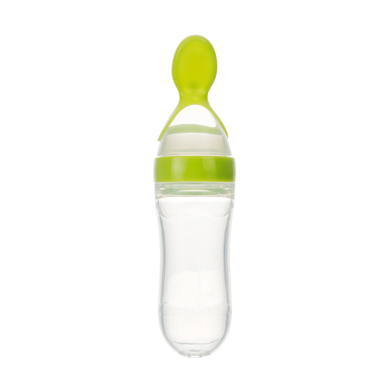 Green baby food squeeze bottle with silicone spoon