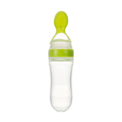 Green baby food squeeze bottle with silicone spoon