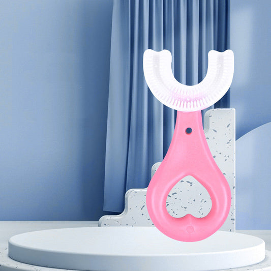 U-shaped baby toothbrush with silicone bristles